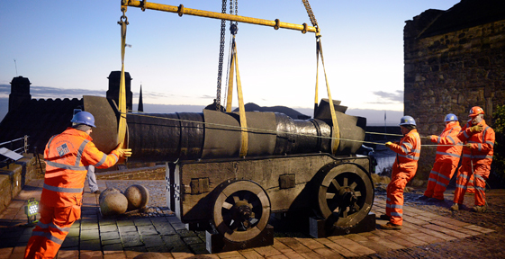 Workers moving Mons Meg