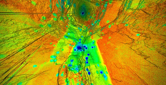 3D scan of the inside of the well. The image is rendered in bright colours - mainly orange and green. The figure ofMark Soultar (Works Manager) is seen in the scan.