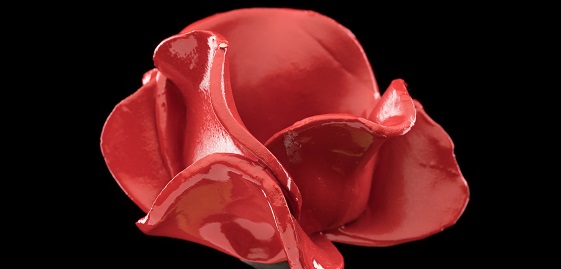 Photo of a ceramic remembrance poppy from the the "Blood Swept Lands and Seas of Red" at the Tower of London in 2014