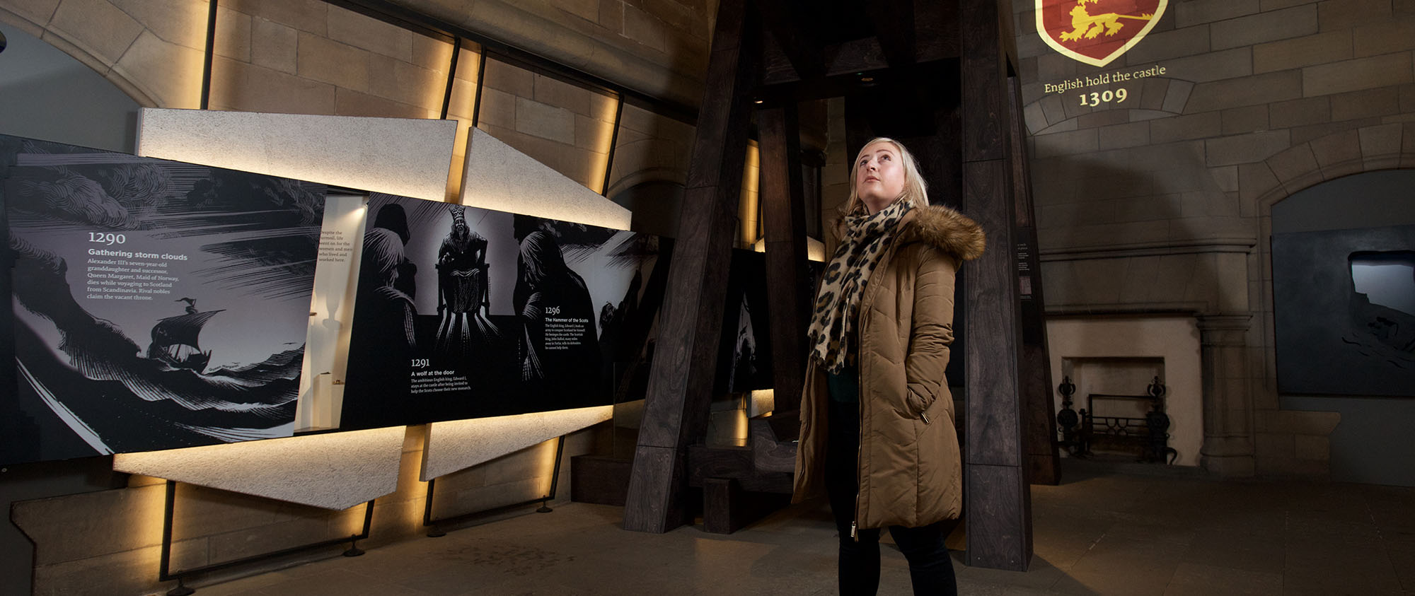 A lady gazing up at the displays at Edinburgh Castle's new exhibition