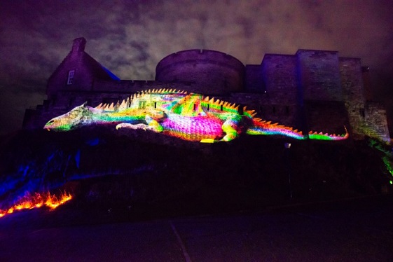 A huge animated dragon projected onto the wall of Edinburgh Castle