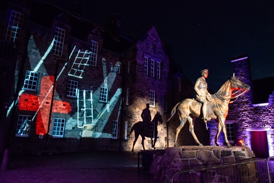 Projection of a soldier on horseback on the Scottish National War Museum as part of the Castle of Light event
