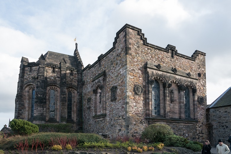 The National War Memorial at Edinburgh Castle decorated with stained glass windows and carved stone figures