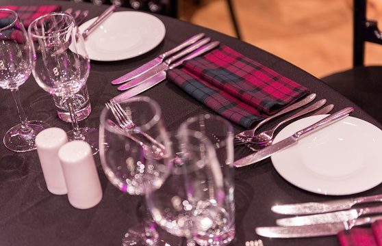 Table set of a Burns supper with tartan napkins