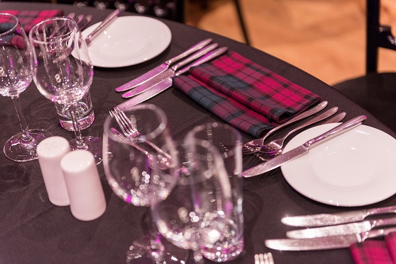Table set of a Burns supper with tartan napkins