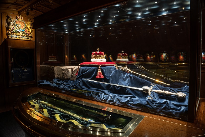 honours of Scotland, which includes a crown, scepter and the Stone of Destiny on display in a glass cabinet.