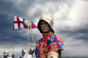 Film still from "The Lost King" showing Harry Lloyd in his role as King Richard III in armour