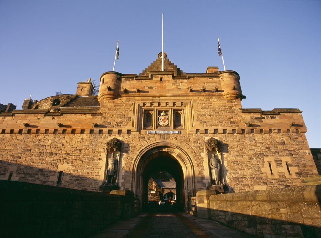 A large medieval looking gate seeming to loom over you. It's the iconic portcullis at Edinburgh Castle.