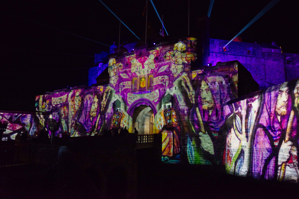 Colourful projections on the front of Edinburgh Castle as part of the Castle of Light event